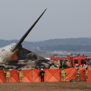 韩国客机起火已致62人死亡